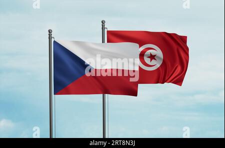 Tunisia e Repubblica ceca sventolano insieme nel vento sul cielo blu, concetto di cooperazione tra due paesi Foto Stock
