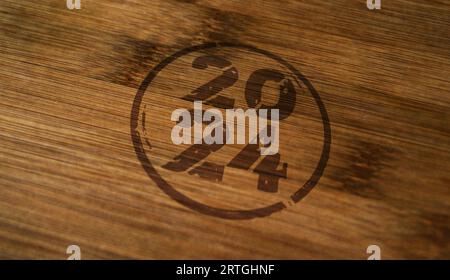 timbro di 2024 anni stampato su scatola di legno. Foto Stock