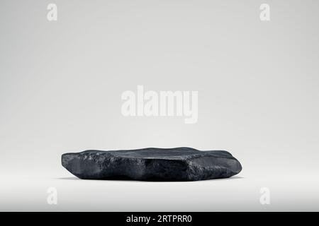 piedistallo di presentazione 3d realizzato in roccia nera naturale. rendering 3d del mockup del podio di presentazione a scopo di visualizzazione o pubblicità Foto Stock