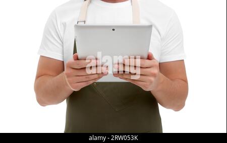 Uomo con tablet su sfondo bianco, primo piano Foto Stock