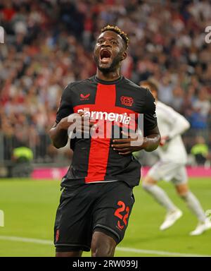 Monaco, Germania. 15 settembre 2023. Victor Boniface di Leverkusen reagisce durante la partita di calcio della Bundesliga di prima divisione tedesca tra il Bayern Monaco e il Bayer 04 Leverkusen a Monaco di Baviera, in Germania, 15 settembre 2023. Credito: Philippe Ruiz/Xinhua/Alamy Live News Foto Stock