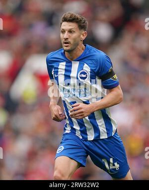 Brighton e Adam Lallana di Hove Albion durante la partita di Premier League all'Old Trafford, Manchester. Data immagine: Sabato 16 settembre 2023. Foto Stock