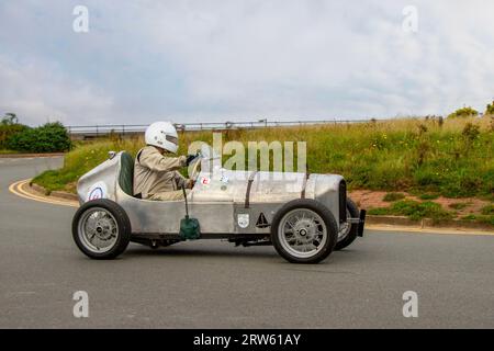 Austin Seven Sports Aluminium anni '1935 30 750cc. Autista Derran D'Archanbaud presso l'Ocean Speed Revival Southport Sprint su Marine Drive. Classico e veloce su una strada pubblica chiusa Coastal Road storico campo da sprint, Merseyside, Regno Unito Foto Stock