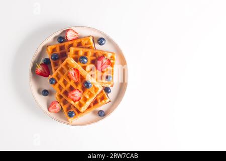 Waffle belgi a colazione. Concetto di dessert. Foto Stock
