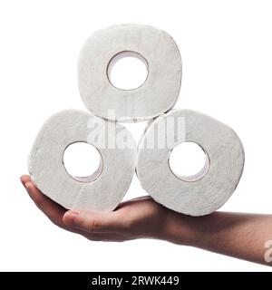 Uomo con tre rotoli di carta toiler sulla sua mano Foto Stock