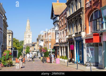 Centro di Gloucester, via Westgate pedonale, con negozi e negozi, e la chiesa di St Nicholas guglia Gloucestershire Inghilterra Regno Unito GB Europa Foto Stock