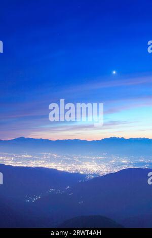 The Hotaka mountain range seen from Ohgahana, Norikura-dake (Mt. Norikura), Matsumoto city and the Evening Star Stock Photo