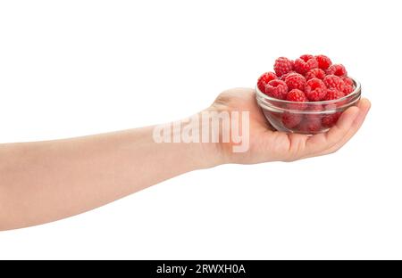 ciotola di lampone nel percorso della mano isolato su bianco Foto Stock