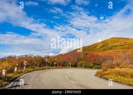 Autumn foliage scenery of the Myoko Mountains seen from the highest point of the Sado Island Sado Skyline and ATC radar of the Air Self-Defense Force Stock Photo