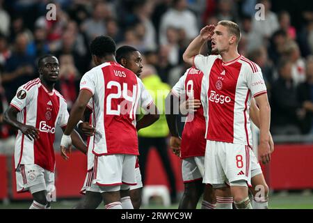 AMSTERDAM - (l-r) Carlos Forbs dell'Ajax, Silvano Vos dell'Ajax, Steven Bergwijn dell'Ajax, Kenneth Taylor dell'Ajax celebrano il 3-2 durante la partita di UEFA Europa League tra l'Ajax Amsterdam e l'Olympique de Marseille nella Johan Cruijff Arena il 21 settembre 2023 ad Amsterdam, Paesi Bassi. ANP OLAF KRAAK Foto Stock