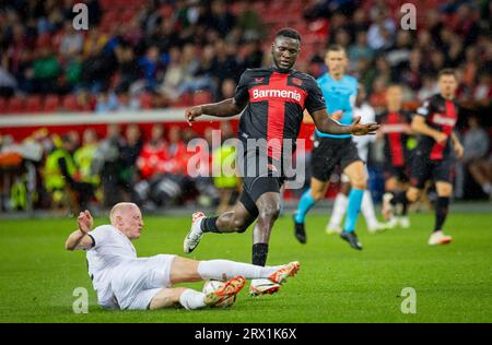 Leverkusen, Germania. 21 settembre 2023. Valgeir Lunddal Fridriksson (BK) Victor Boniface (Leverkusen) Bayer Leverkusen - BK Häcken 21.09.2023 Copyright Foto Stock