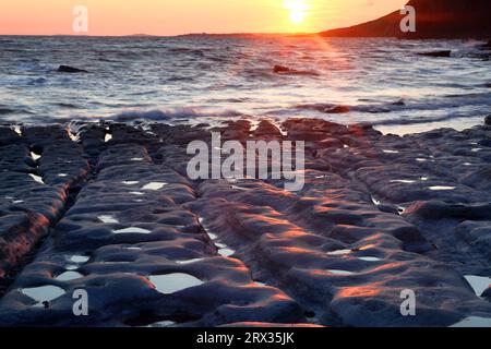 Tramonto da Dunraven Bay, Southerndown, Glamorgan Heritage Coast, Galles del Sud, Regno Unito, Europa Foto Stock