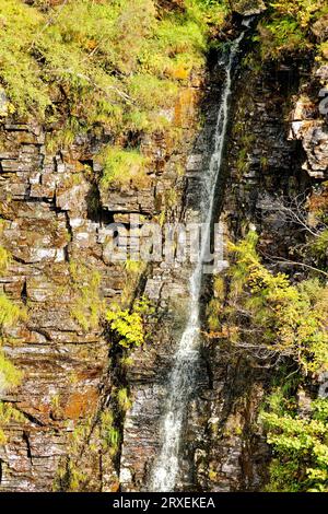 Corrieshalloch Gorge Braemore junction Scotland a waterfall on the side of the deep gorge in late summer Foto Stock