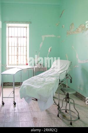 Sala esame paziente nell'abbandonato Trans Allegheny Lunatic Asylum, a Weston, West Virginia Foto Stock