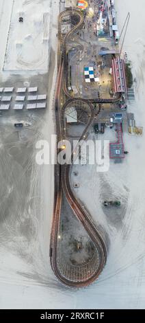 Grandi montagne russe in legno presso il lungomare di Wildwood, New Jersey al tramonto. Foto Stock