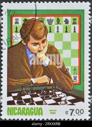 Francobollo cancellato stampato da Nicaragua, che mostra Chess, Early in the Game and Thinking About the Game, intorno al 1983. Foto Stock