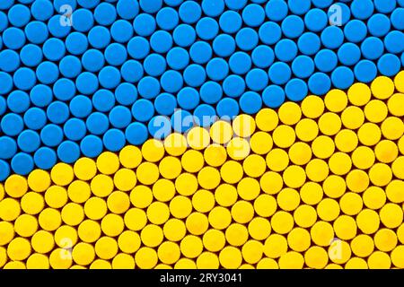 Texture giallo Xing, sfondo da sughero di bottiglie di plastica. Colori blu e giallo della bandiera nazionale della Svezia, Ucraina Foto Stock