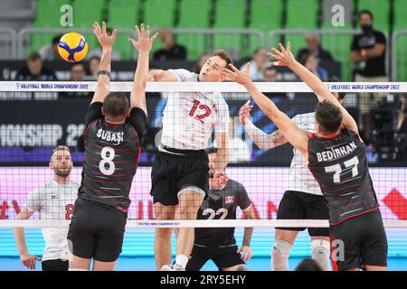 Lucas Van Berkel, (Canada), Burutay Subasi, Bedirhan Bulbul (Turchia). Campionato del mondo di pallavolo 2022. Foto Stock