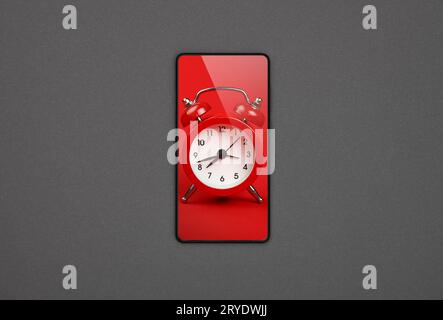 Smartphone con schermo rosso della sveglia su grigio Foto Stock