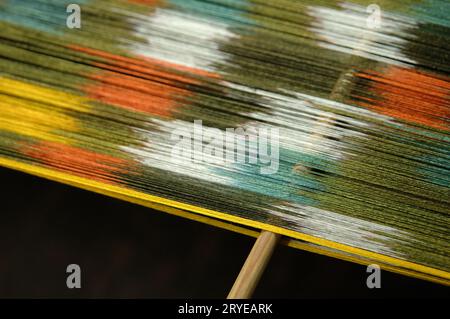 Produzione e tessitura di tappeti e tessuti Foto Stock