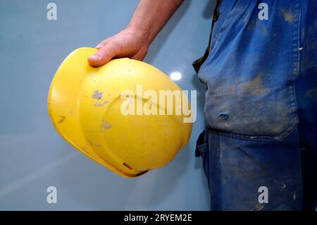 Elmetto di sicurezza come protezione per la testa Foto Stock