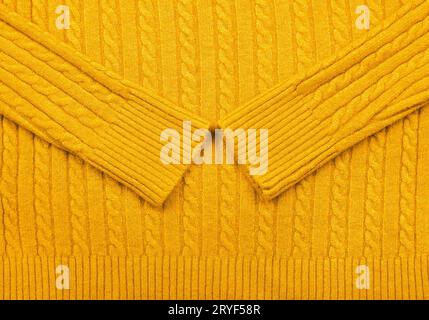 Trama di fondo di tessuto giallo di lana lavorato a maglia Foto Stock