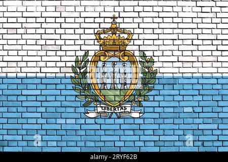 Bandiera di San Marino dipinta su un muro di mattoni Foto Stock