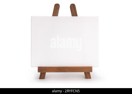 Cavalletto in legno con tela vuota isolata su sfondo bianco Foto Stock