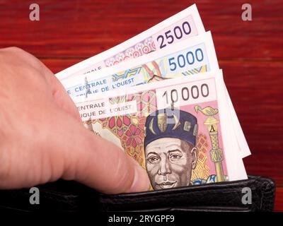 Old West African States Money - Franco nel portafoglio nero Foto Stock