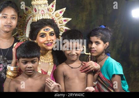 Un servizio fotografico concept Agomoni per i bambini svantaggiati. Maa Durga agomoni Shoot Concept.cultura indiana durga puja. Foto Stock