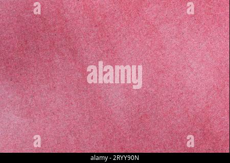 Carta rosa sfondo testurizzato. Dettaglio di primo piano del materiale Foto Stock