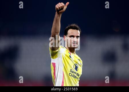 Monza, Italia. 22 dicembre 2024. Federico gatti della Juventus FC festeggia al termine della partita di serie A tra l'AC Monza e la Juventus FC allo U-Power Stadium il 22 dicembre 2024 a Monza. Crediti: Marco Canoniero/Alamy Live News Foto Stock