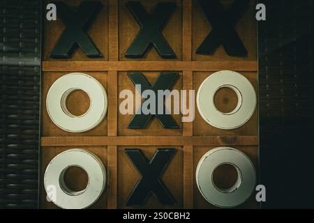 Primo piano del tabellone di legno del TIC tac Foto Stock