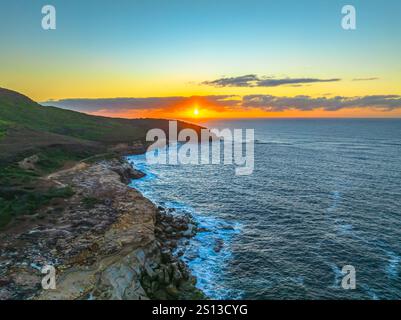 Alba sul mare da Putty Beach n Bouddi National Park a Killcare Heights sulla Central Coast, NSW, Australia. Foto Stock