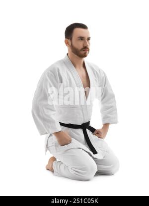 Combattente di karate in uniforme su sfondo bianco Foto Stock