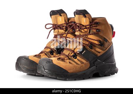 Scarponi da trekking isolati su sfondo bianco Foto Stock