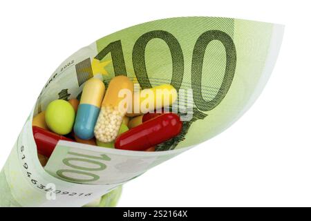 Tavolette e banconote da cento euro foto simbolica: Costi per la medicina e i farmaci dell'industria farmaceutica Austria Foto Stock