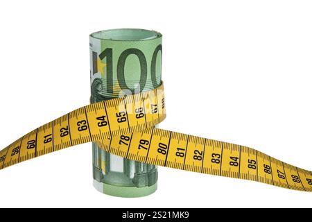 Immagine simbolica di un pacco di risparmio con banconota in euro e metro a nastro Austria Foto Stock