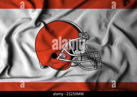 Pringsewu, Lampung; 5 gennaio 2025; texture di una bandiera ondulata con il logo della squadra di football americano NFL Cleveland Browns, Stati Uniti. 3D. Foto Stock