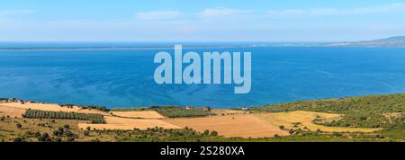 Summer panoramic view of Lago di Varano (Varano lake) on the Gargano peninsula in Puglia, Italy. Two shots stitch panorama. Stock Photo