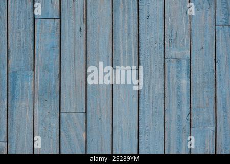Tavole di legno blu vintage con motivo astratto . Sfondo in legno scrosciato con struttura a grani e graffi Foto Stock