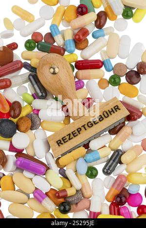 Timbrare le compresse colorate, la foto del simbolo per i farmaci, i requisiti di prescrizione e il co-pagamento Foto Stock