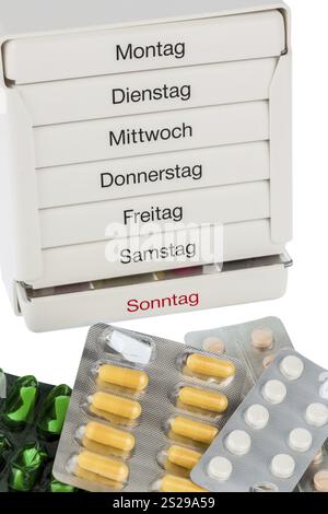 Dispenser per tablet e compresse, foto simbolo per terapia, prescrizione, dosaggio Foto Stock