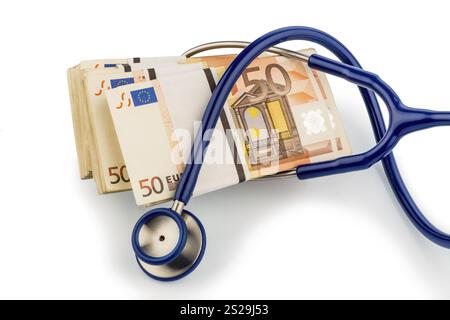 Stetoscopio e banconote in euro, foto simbolica per l'unione monetaria, stabilità e rischi per l'euro Foto Stock