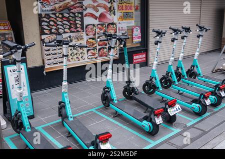 Scooter elettrici Luup a Tokyo in Giappone Foto Stock