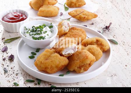 Pepite di pesce con tuffi Foto Stock