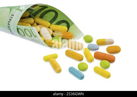 Tavolette e banconote da cento euro foto simbolica: Costi per la medicina e i farmaci dell'industria farmaceutica Austria Foto Stock