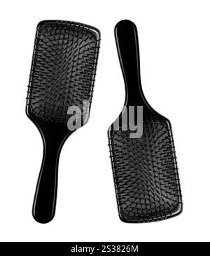 Spazzole per capelli su sfondo bianco Foto Stock