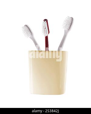 Tre spazzolini in vetro isolati su sfondo bianco. Tre spazzolini in vetro Foto Stock