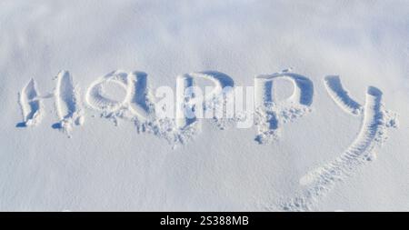 Parola Panorama felice impronta su foto di neve ghiacciata pura. Parola panoramica: Un'impronta felice sulla neve pura e ghiacciata Foto Stock